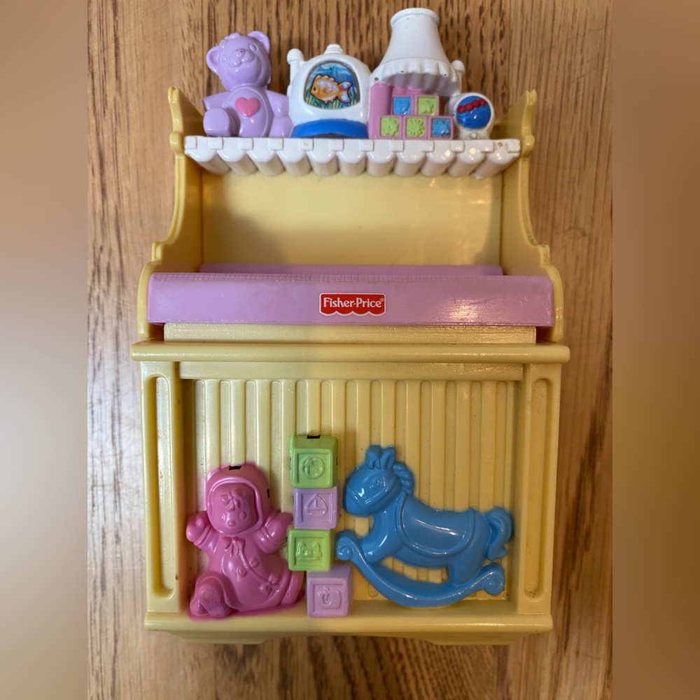 Fisher Price Loving Family Dollhouse
Musical Baby Changing Table